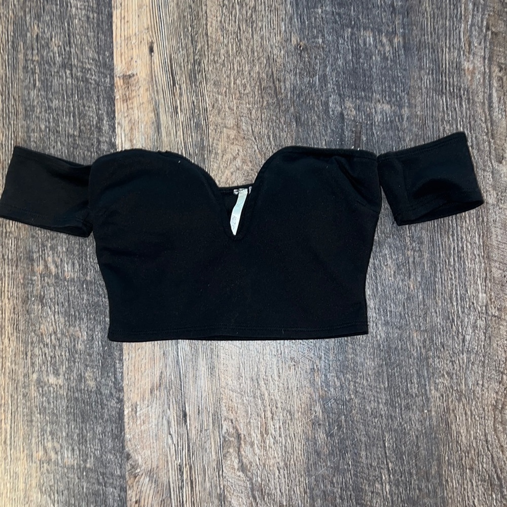 Off the shoulder black crop top.